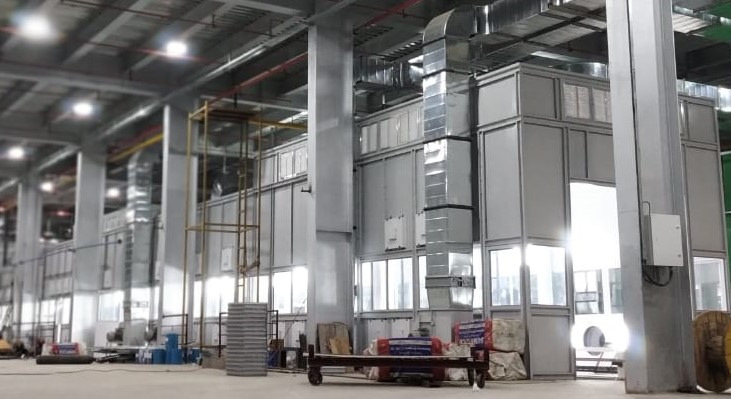 Industrial surface-finishing equipment inside a facility.